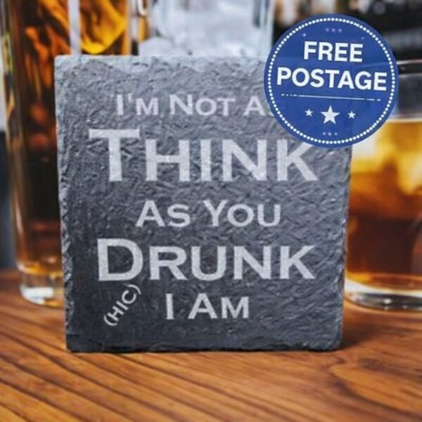 Laser-engraved slate coaster with the humorous quote ‘I’m not as think as you drunk I am’ displayed on a bar surface