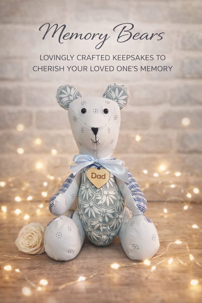 Handmade memory bear created from sentimental clothing, featuring a soft blue and white fabric design with a wooden heart tag engraved “Dad”.