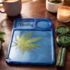 Personalised Blue Resin Herb Tray with Matching Ashtray Personalised blue resin herb tray with botanical leaf design, matching ashtray and accessory holder on a wooden table