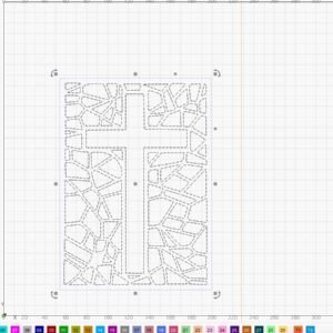Stained glass cross suncatcher SVG shown as a laser cut template in design software for digital download
