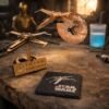 Handcrafted X-wing gift set featuring wooden starfighter model, Death Star style clock with attached X-wing and engraved slate coaster in warm workshop setting